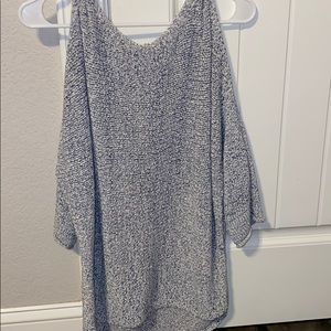 knitted sweeter, with cold shoulders.